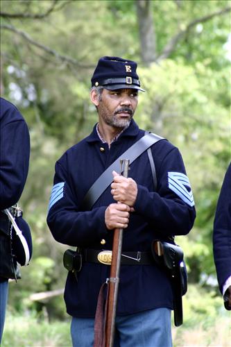 Portaits of Civil War interpreters of U.S. Colored Troops with their rifles at Stones River National Battlefield, April 2004