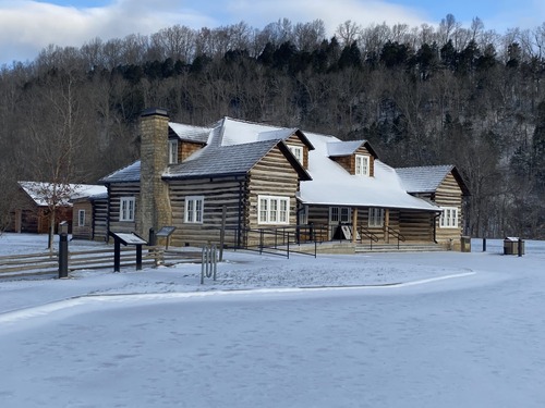 log tavern in the snow