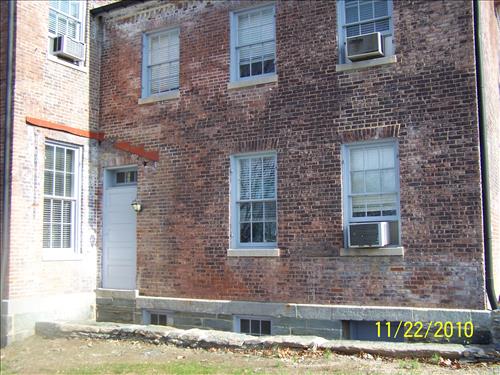 Restoration of the stone foundation walls for the southwest porch of the historic Brackett House, HAFE/NPS, November 22, 2010.