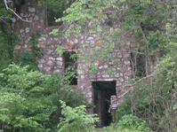 The ruins of Welch Hospital stand near Welch Spring.