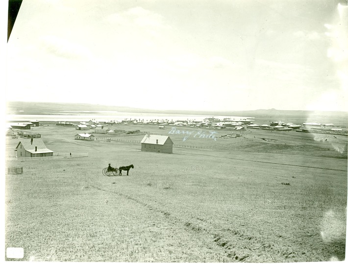 View of Fort Yates, North Dakota with a Man in a Cart