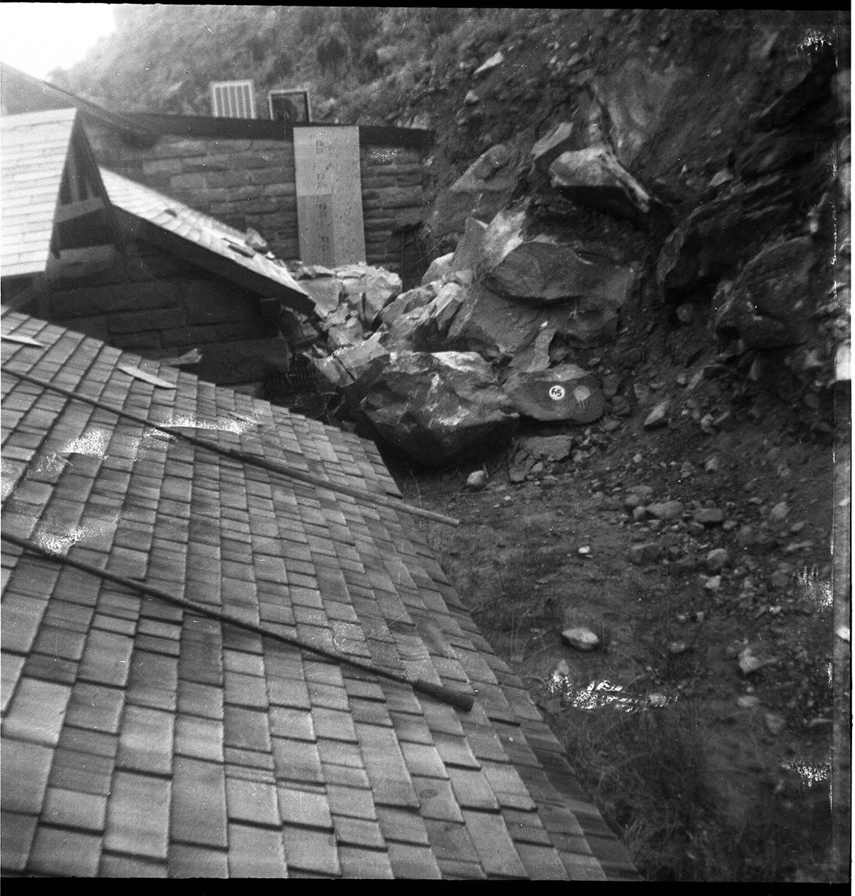 BW photo of rock slide in the maintenance yard.