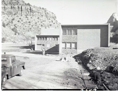 Wall construction and footings for the employee parking area at the rear of Mission 66 Visitor Center and Museum.