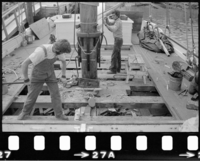 Alma (built 1891; scow schooner)  mast and rigging repair work. Three photographs of the replacement of Alma's (built 1891; scow schooner) mast in 1984.