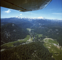 Aerial Views looking up Warner Valley to Lassen Peak. Robert Campbell HIstorical Photograph Collection: Warner Valley showing Drakesbad, Lassen Peak and surrounding range from above Warner Valley
