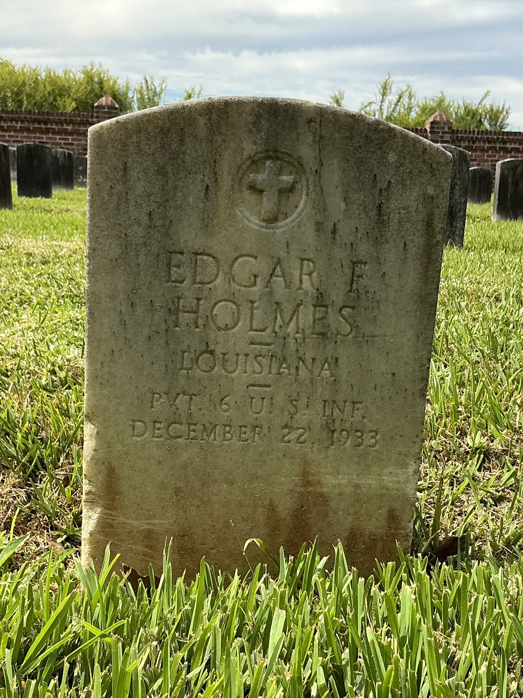 Front of upright marble headstone with flat face.