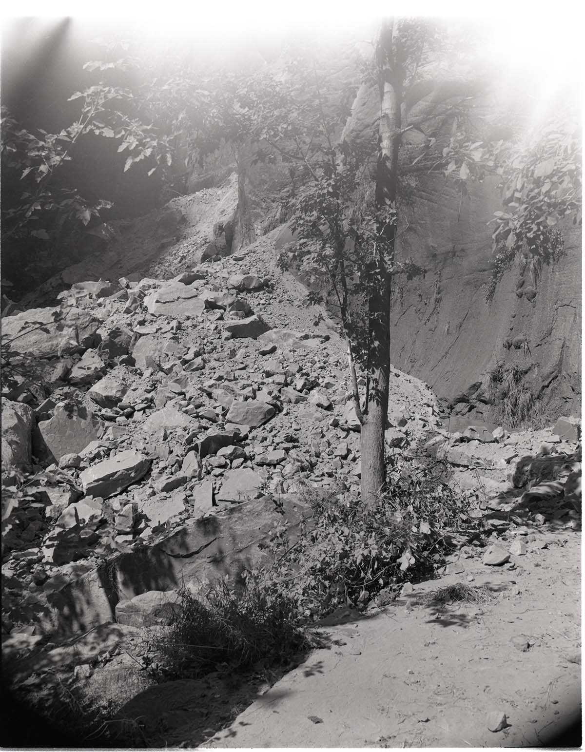 BW photo of a rock slide along the Narrows Trail.