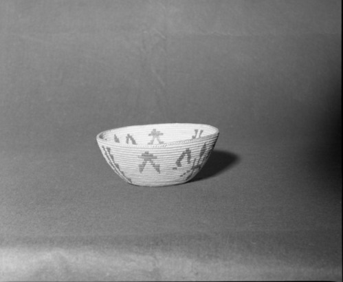 Mrs. Donald Segerstrom Collection. Object: Paiute basket. Dimensions: 8 x 3 1/4". Materials: split willow, bracken fern root, redbud. Technology: non-interlocking stitching, fag ends trimmed on work face, moving ends trimmed on interior, overstitched rim, leftward coil direction. Collection History: ---. Photographed by Michael Dixon, 1/83. Catalogued by Craig Bates and Barbara Beroza. Yosemite Collections, National Park Service.