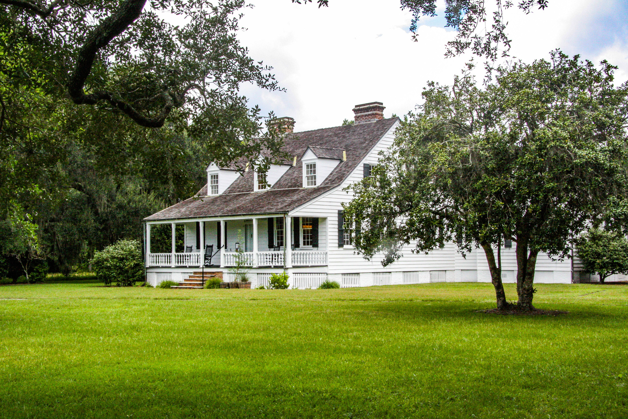 Historic white farm house and lawn