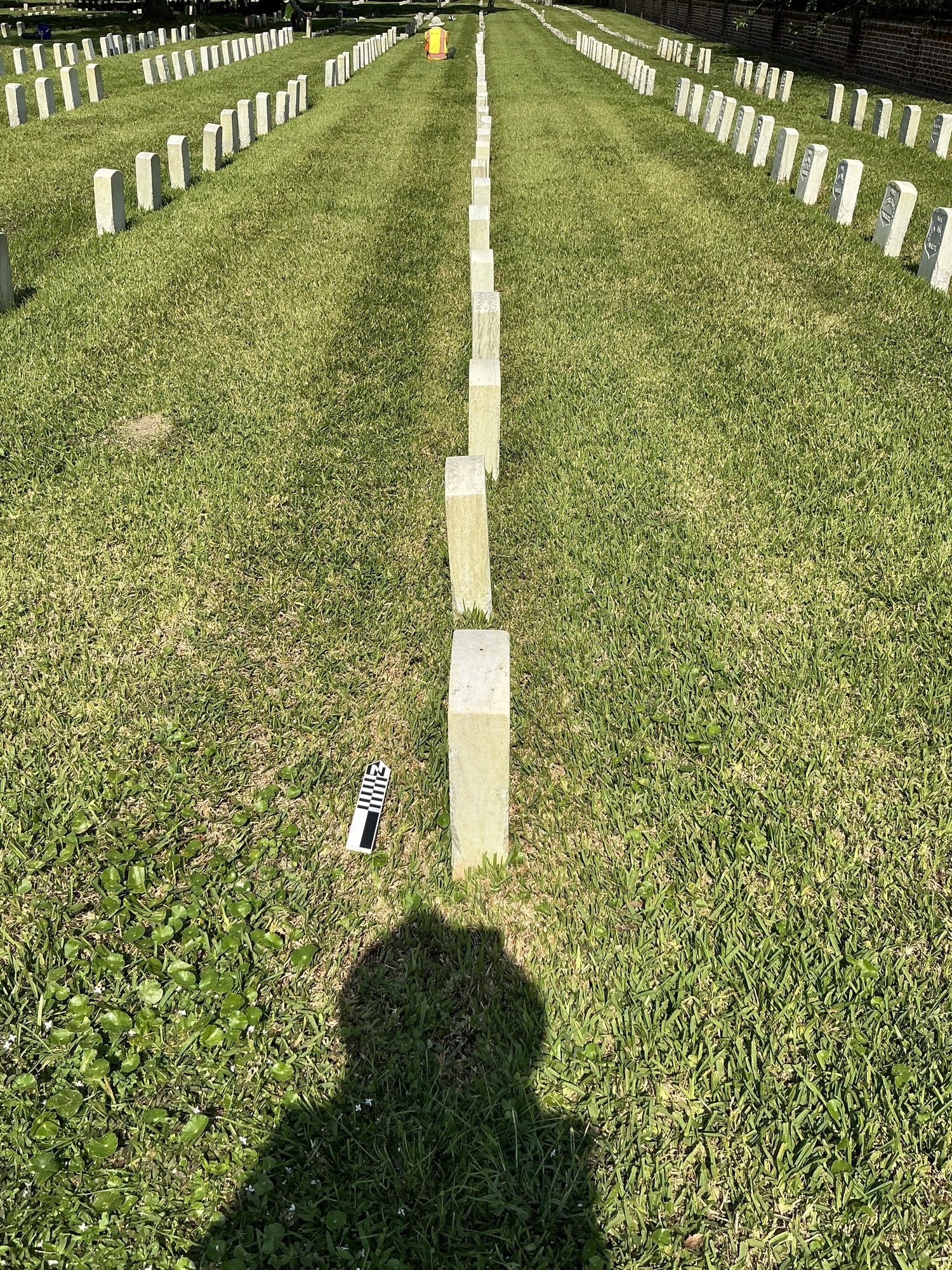 Extra image of historic upright marble headstone with recessed shield face.
