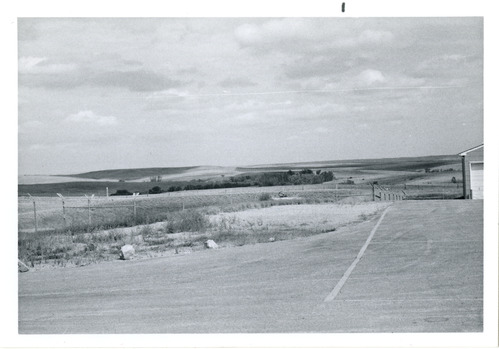 Prairie lanndscape from a fenced compound