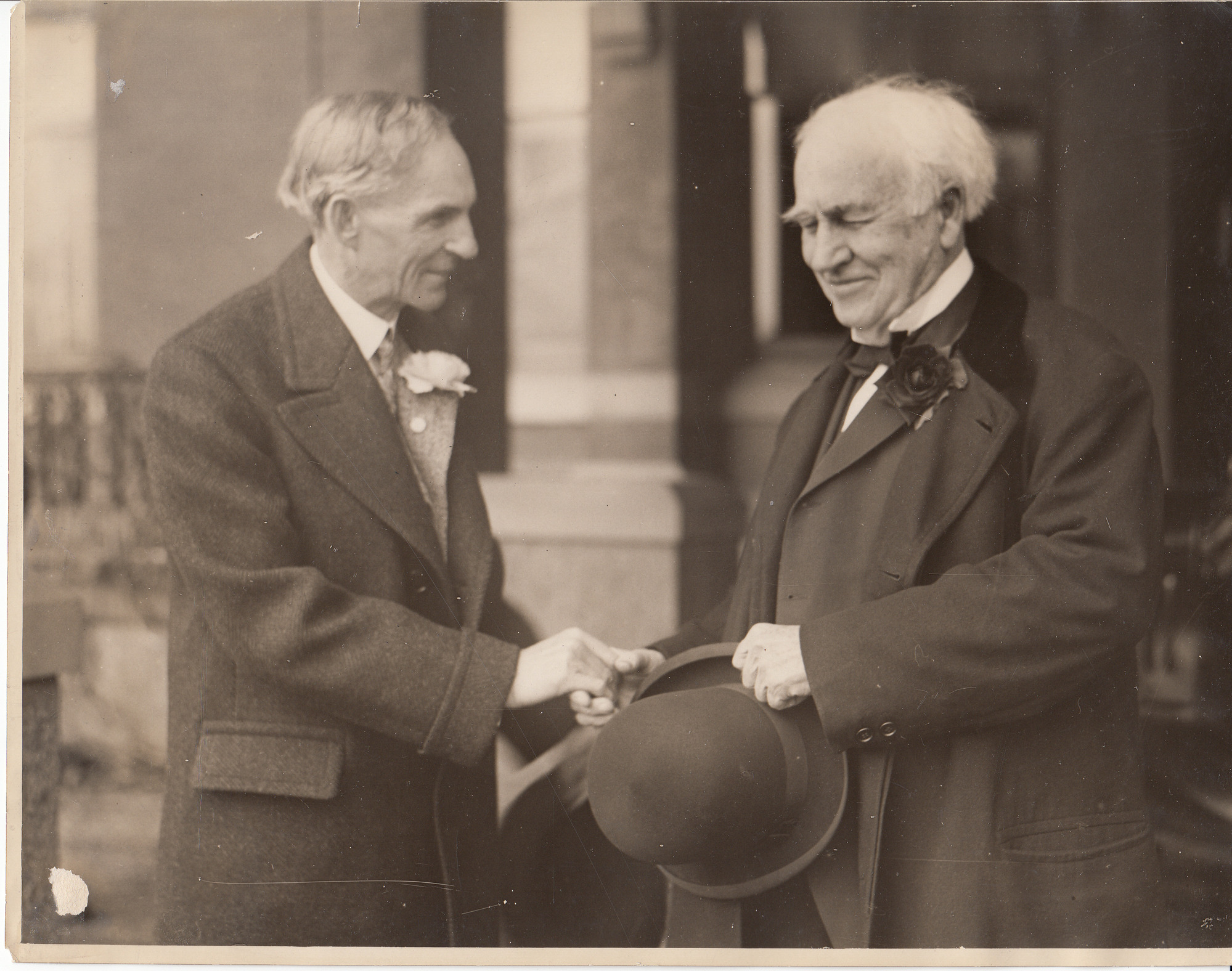 Henry Ford shaking hands with Edison in front of Glenmont on the latter's 80th birthday.