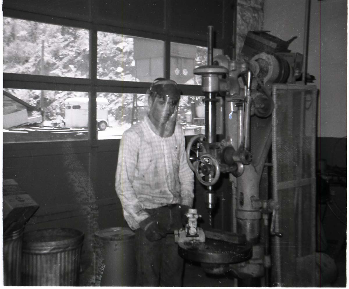 BW Photo of Navajo workers in wood shop.