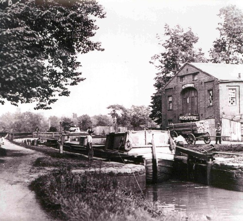 Historical black and white photo of the veterinary hospital in Georgetown, Washington, DC, that took care of sick and injured mules during the Canal's peak operation.
