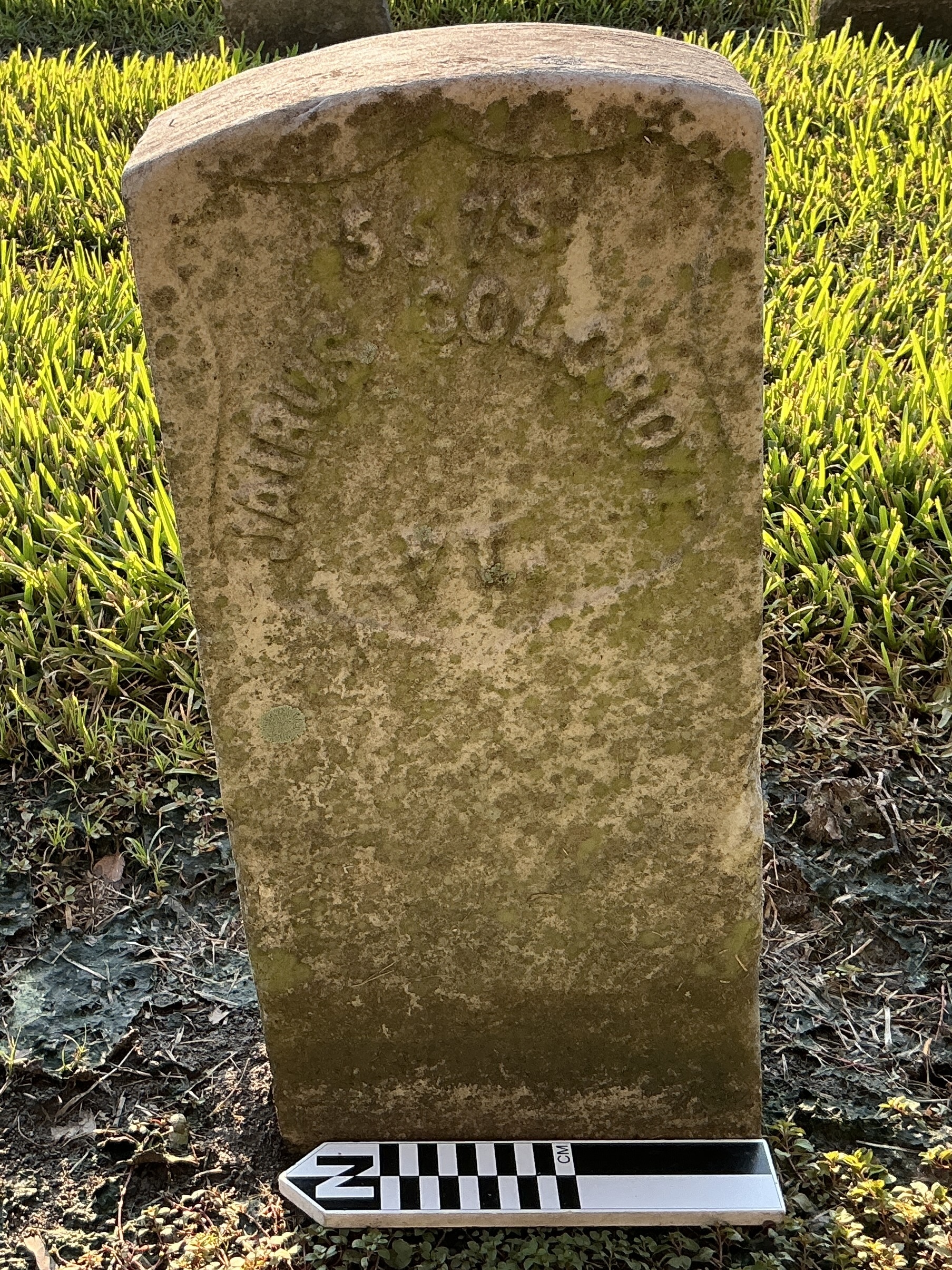 Extra image of historic upright marble headstone with recessed shield face.