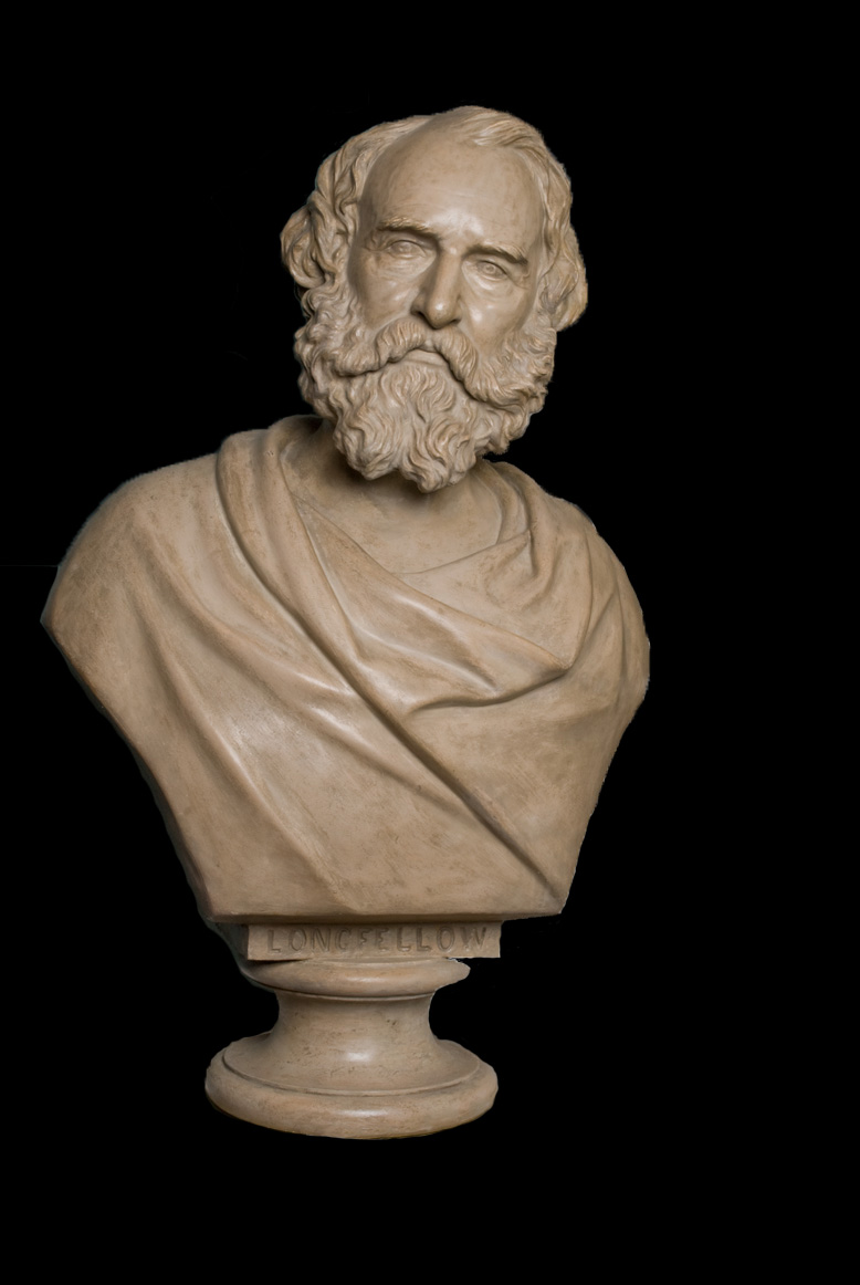 Tan bust of Henry Longfellow with full beard and mustache, classical draping on chest
