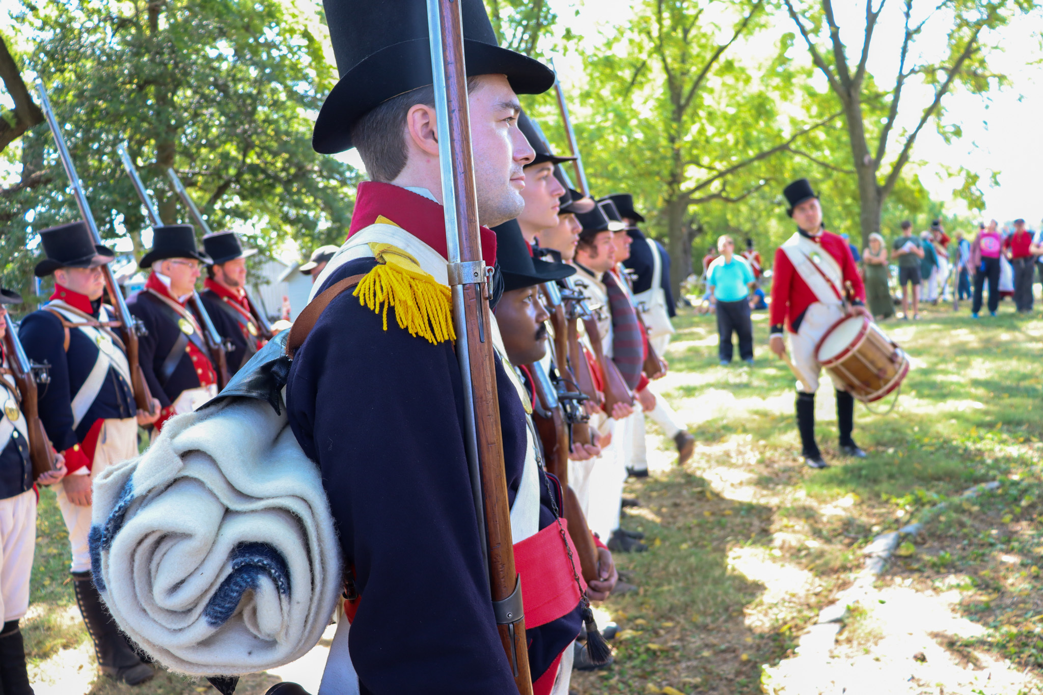Living historians at Todd's Inheritance with visitors in the background