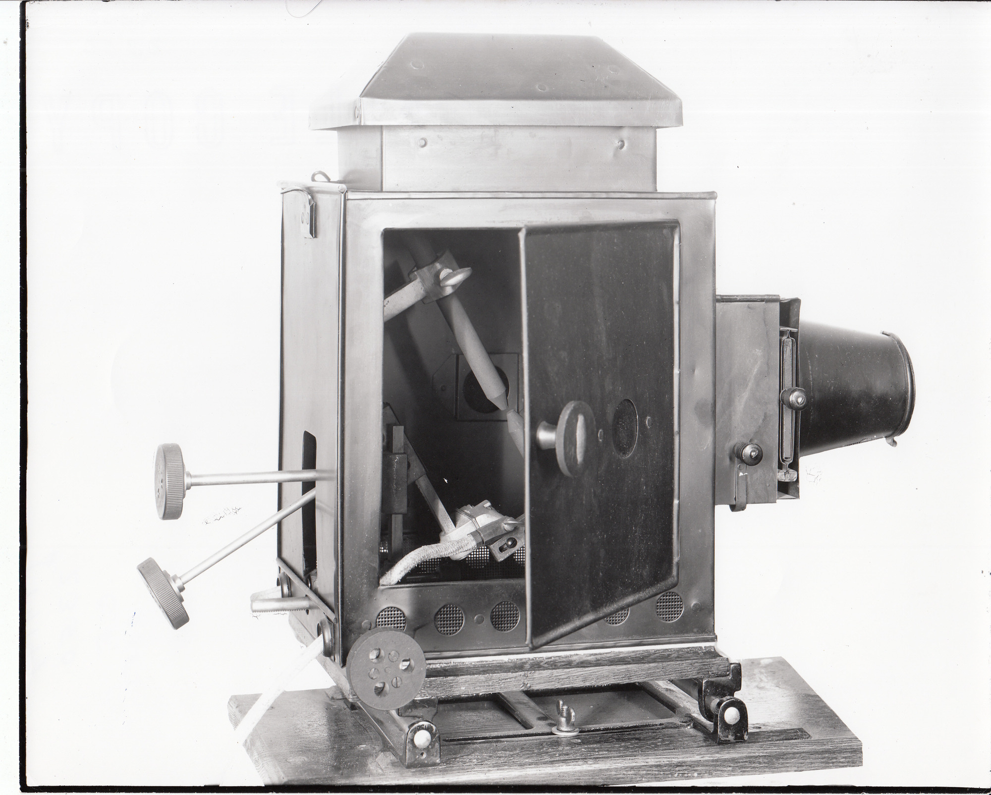 Edison projecting kinetoscope, exhibition model, detail of lamp housing, door open.