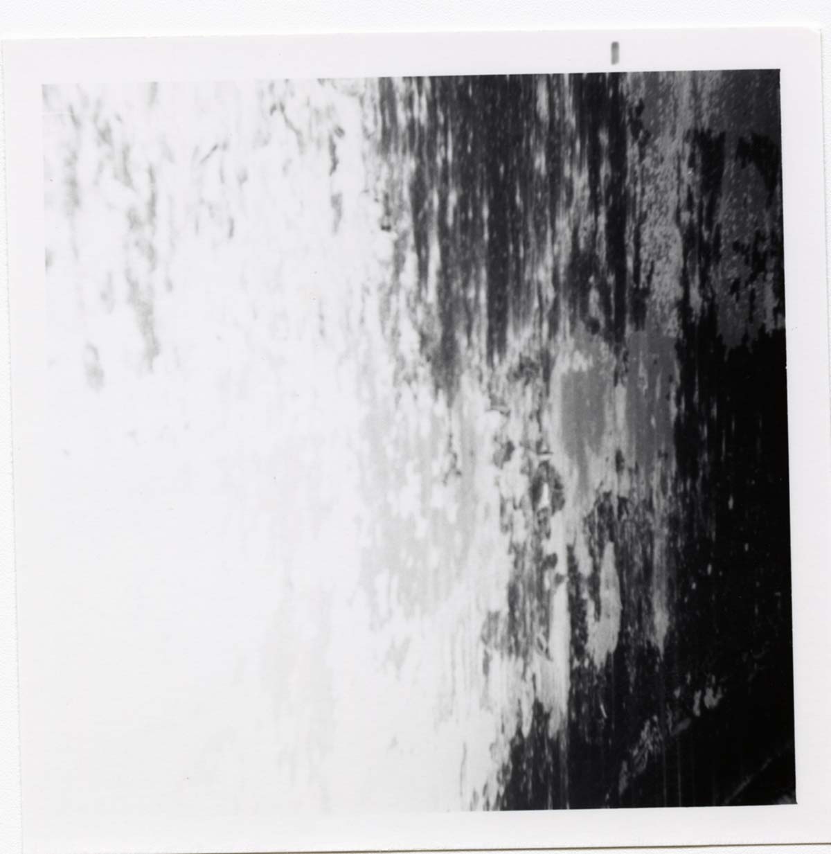 The interior of the 40000 gallon water tank showing buildup/corrosion.