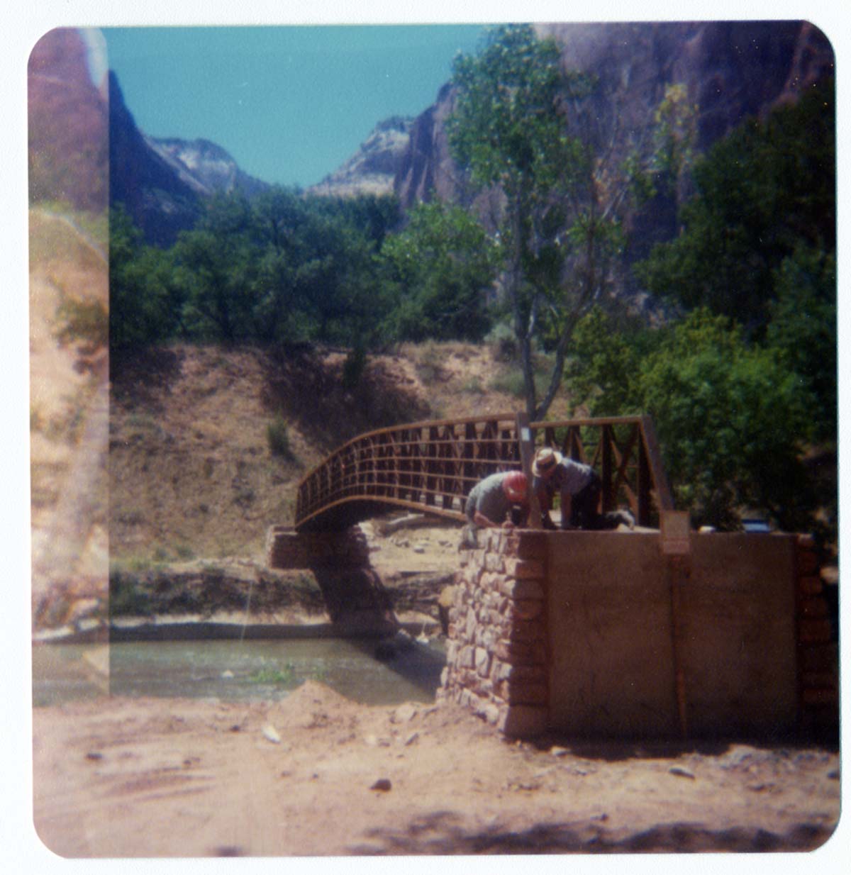 Workers during the arrival and replacement of the new Birch Creek footbridge.