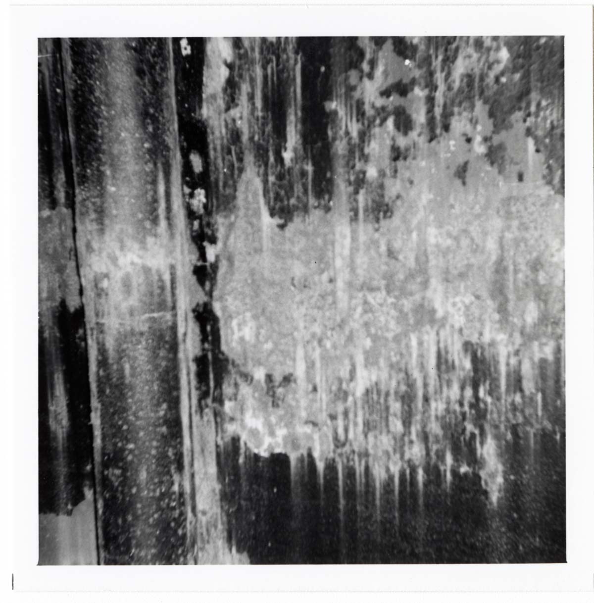 The interior of the 40000 gallon water tank showing buildup/corrosion.