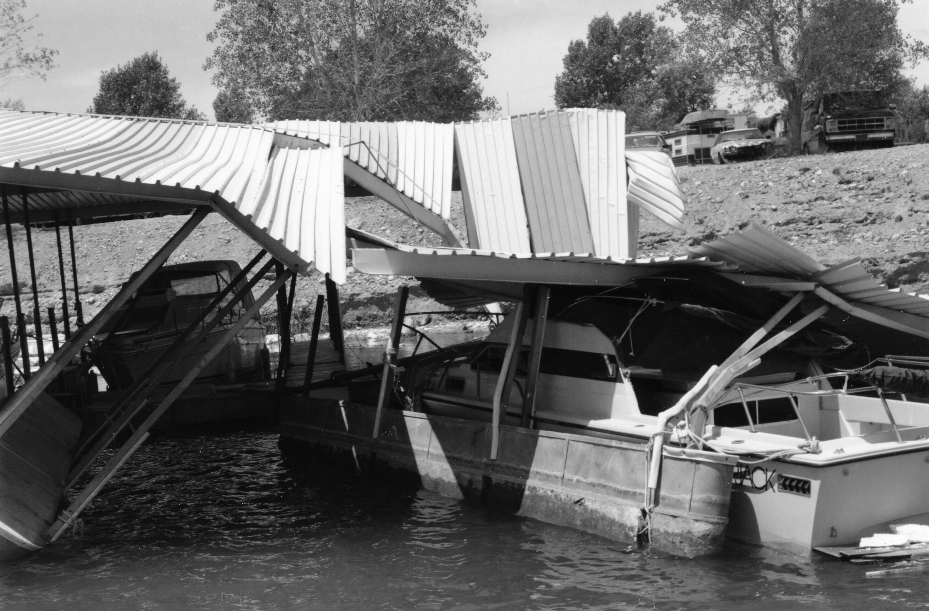 Damaged dock and boats blown close to shore at Callville Bay