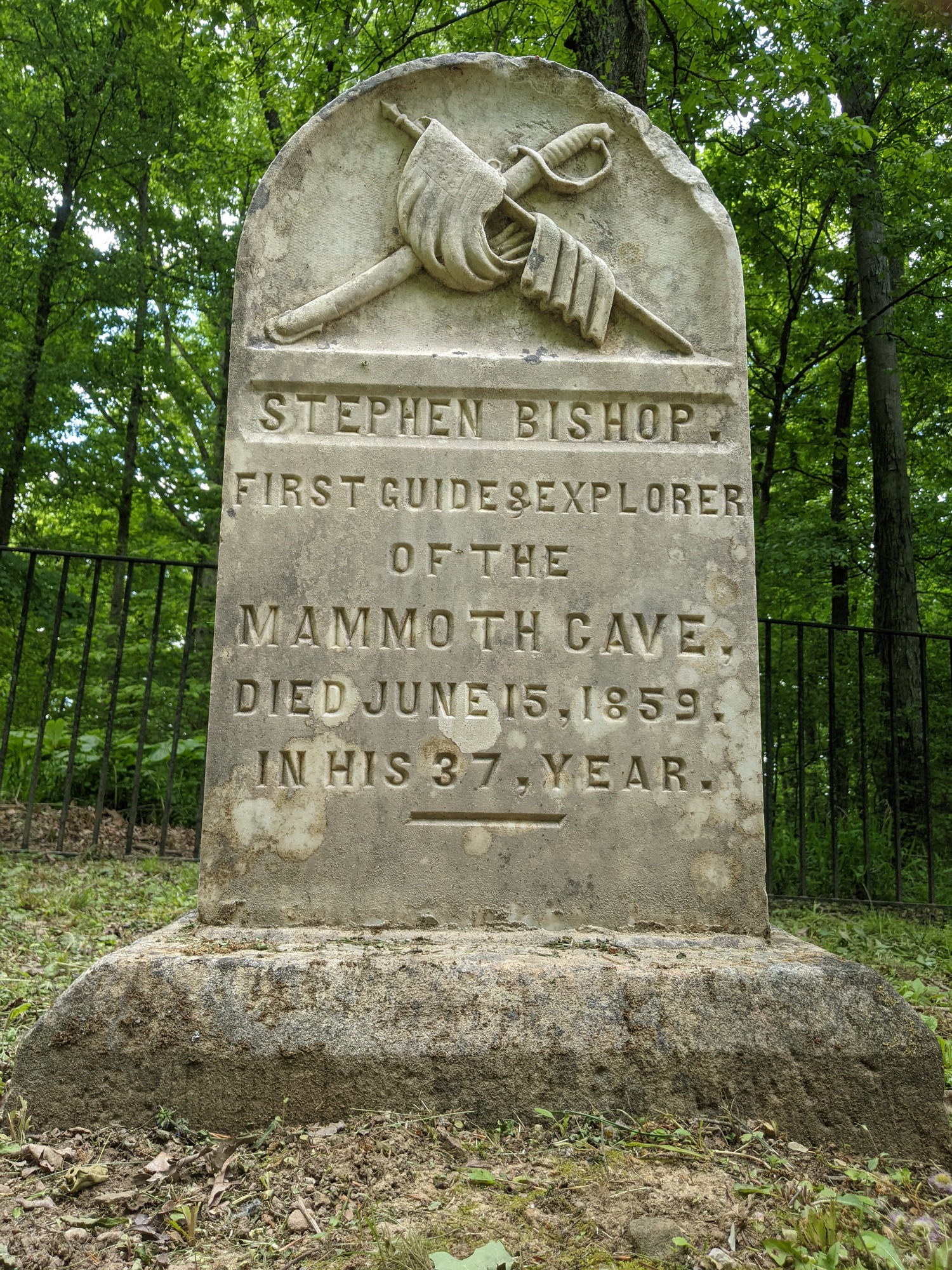 A large stone headstone. 