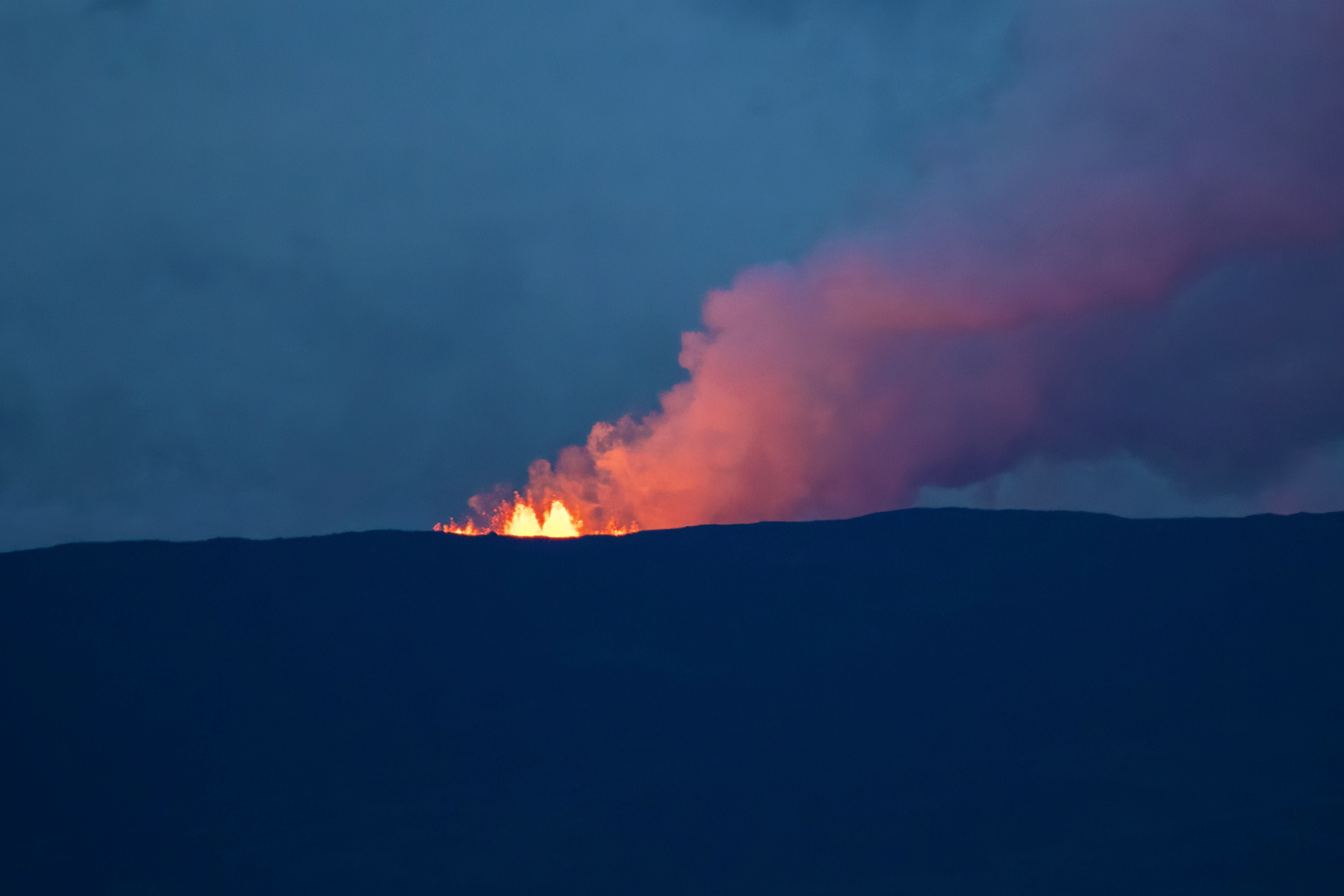 Large fountains of lava on the ridge of Mauna Loa volcano.
