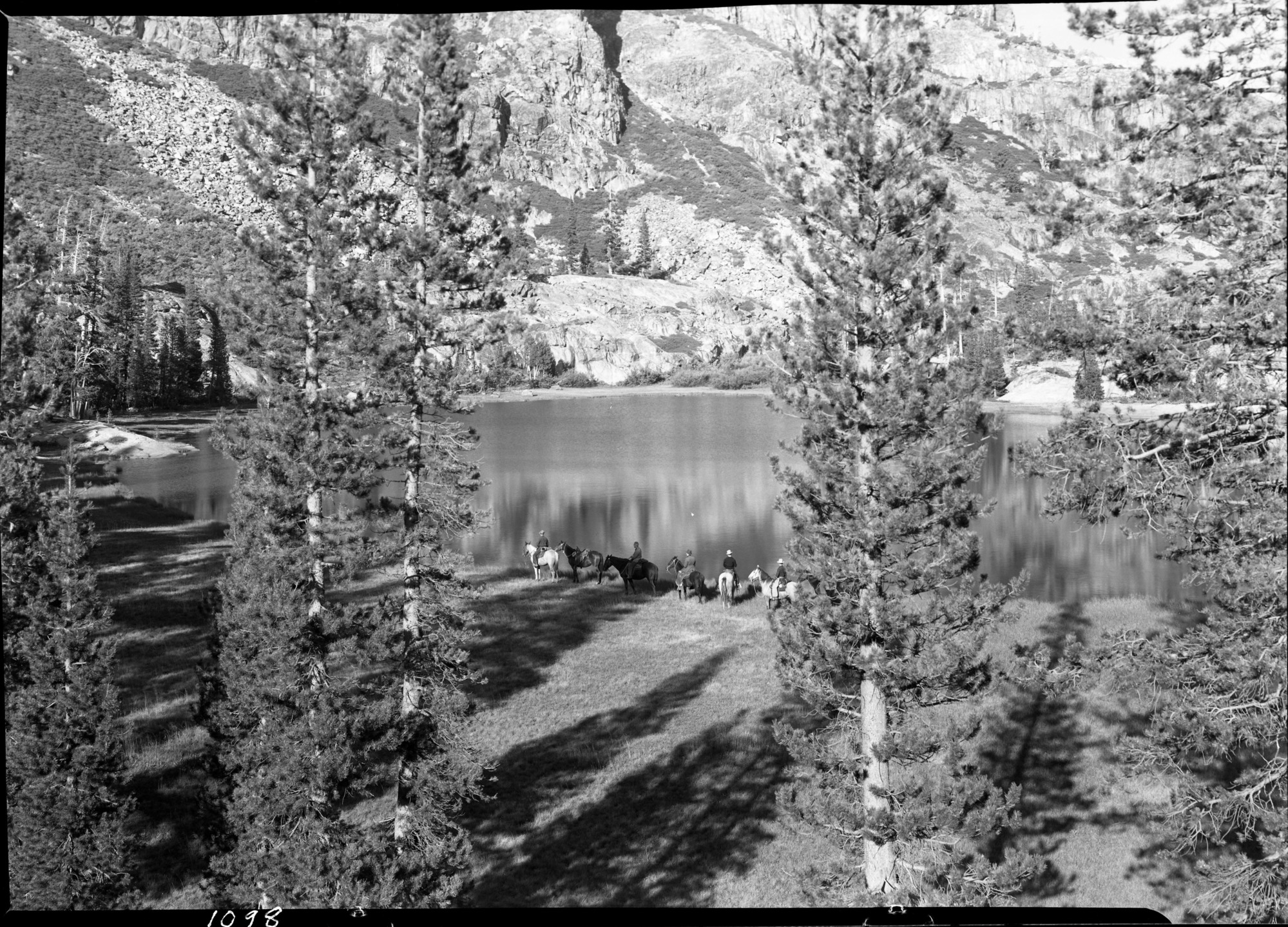 Group on shores of lake in Jack Main Canyon.