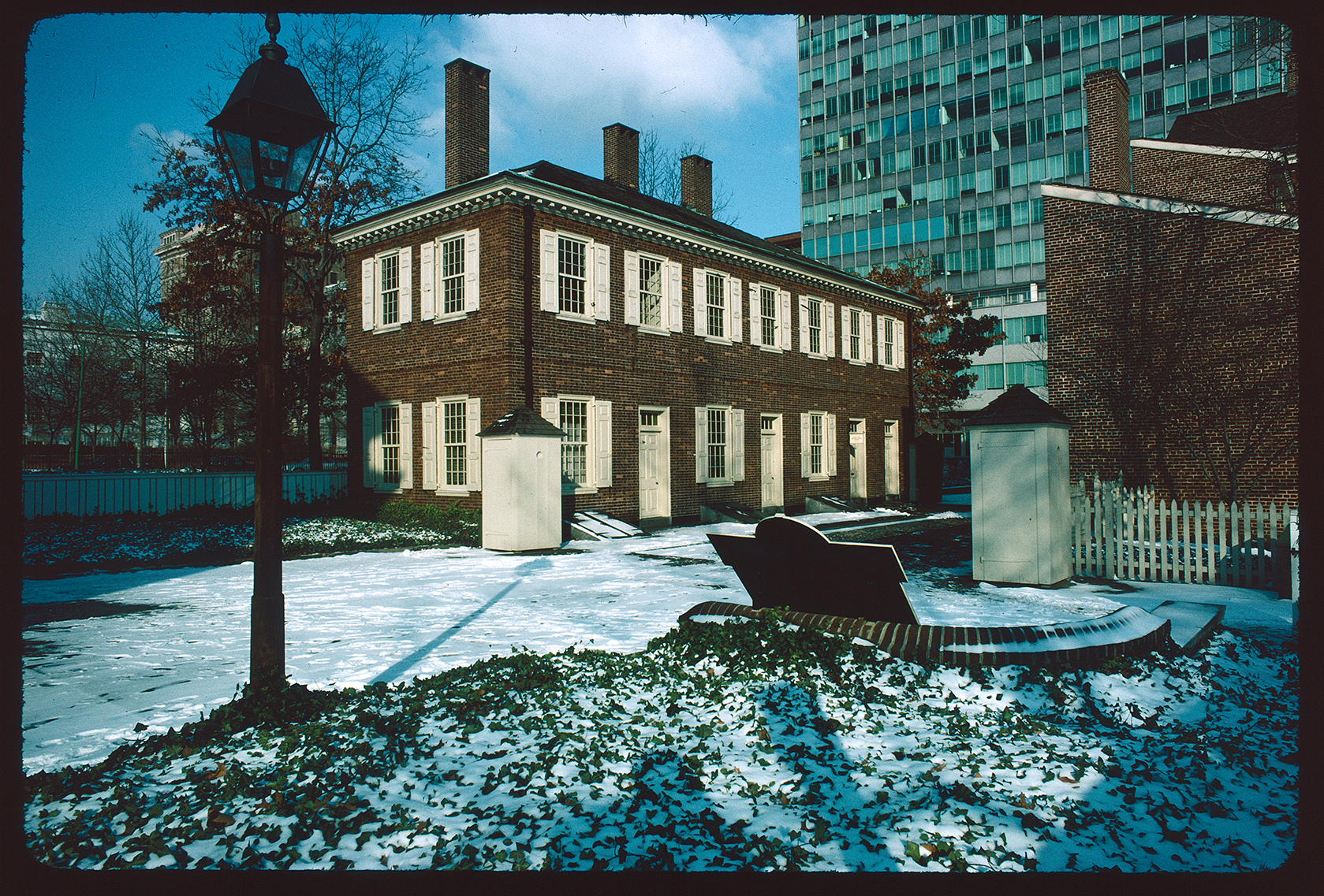 New Hall. Exterior. Front and left (south) sides. Looking northwest. Snow on ground.