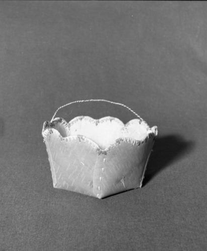 Marie Rozier Collection, Catalog No. 2-CAN-2. Object: Shuswap (Salishan) basket. Dimensions: 10 x 6". Materials: Birchbark, split shoot, wire. Collection History: Purchased at 150 Mile House near Williams Lake in British Columbia in 1970. Photographed by Michael Dixon, December 1982. Catalogued by Craig Bates and Barbara Beroza. Yosemite Collections, National Park Service.