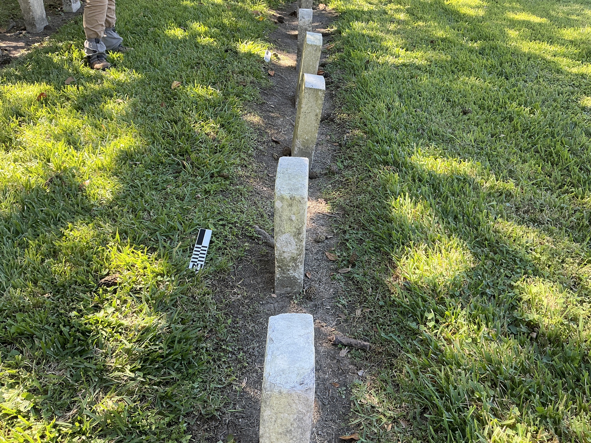 Extra image of historic upright marble headstone with recessed shield face.