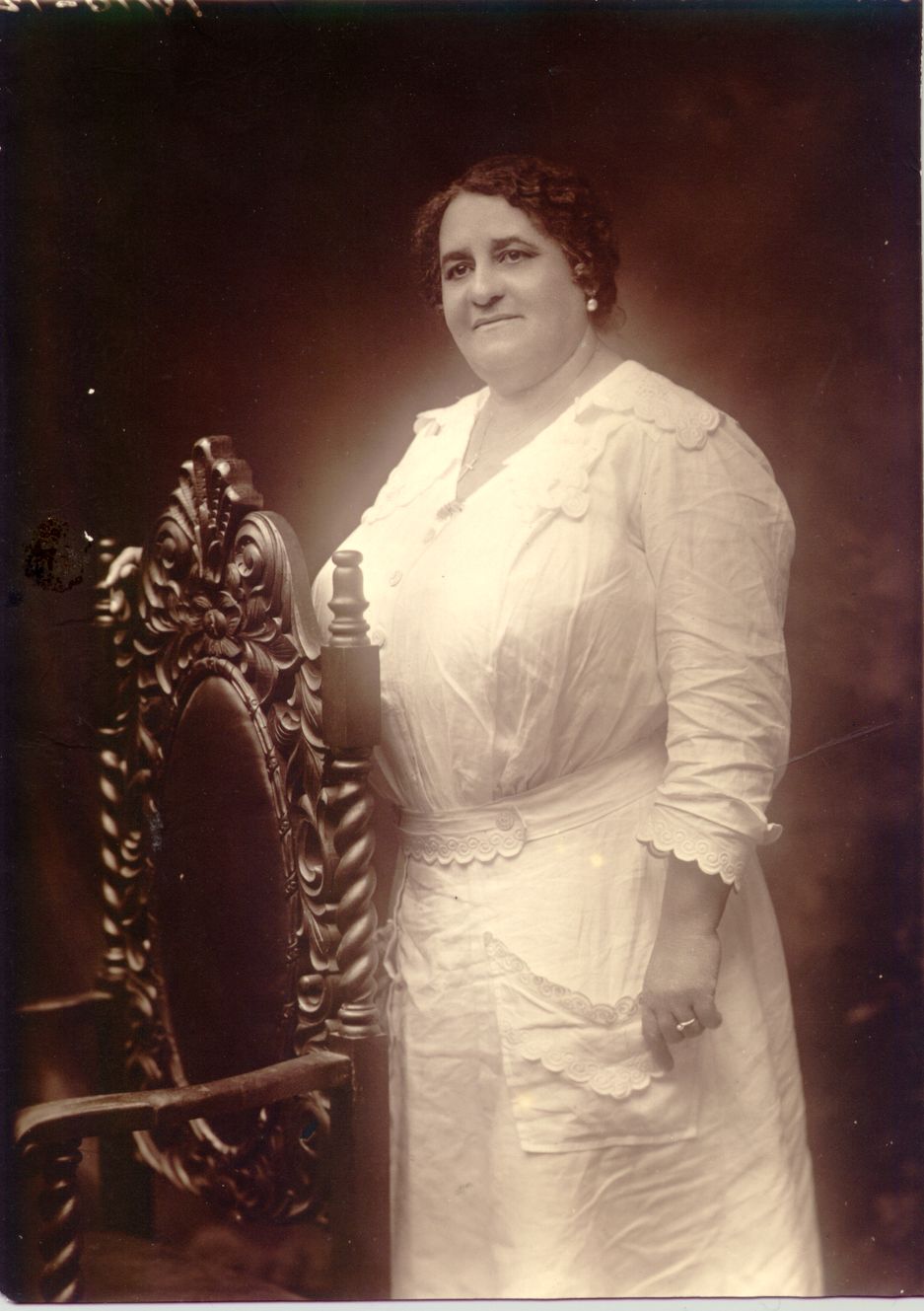 Maggie Lena Walker wearing a white dress