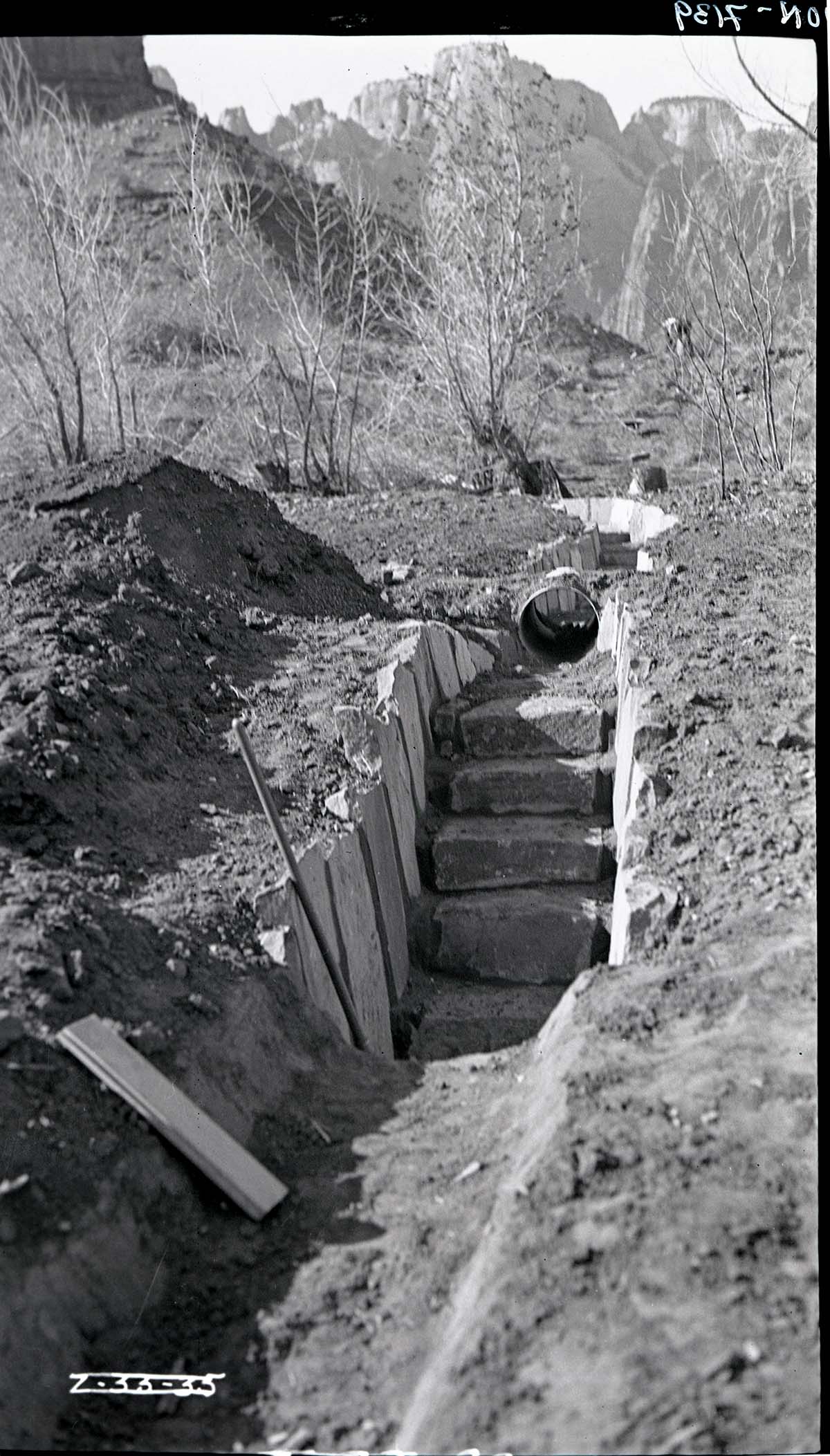 Irrigation ditches and water droplets during construction.