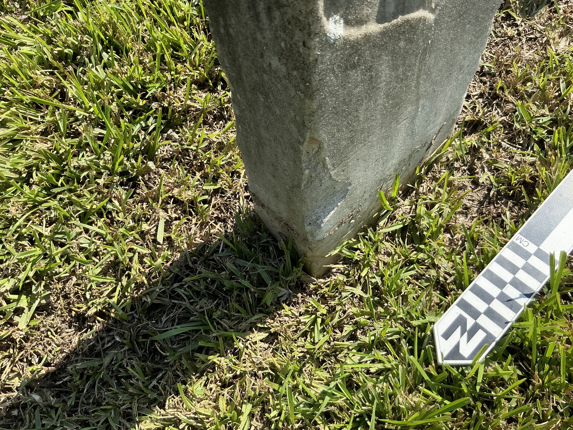 Extra image of historic upright marble headstone with recessed shield face.