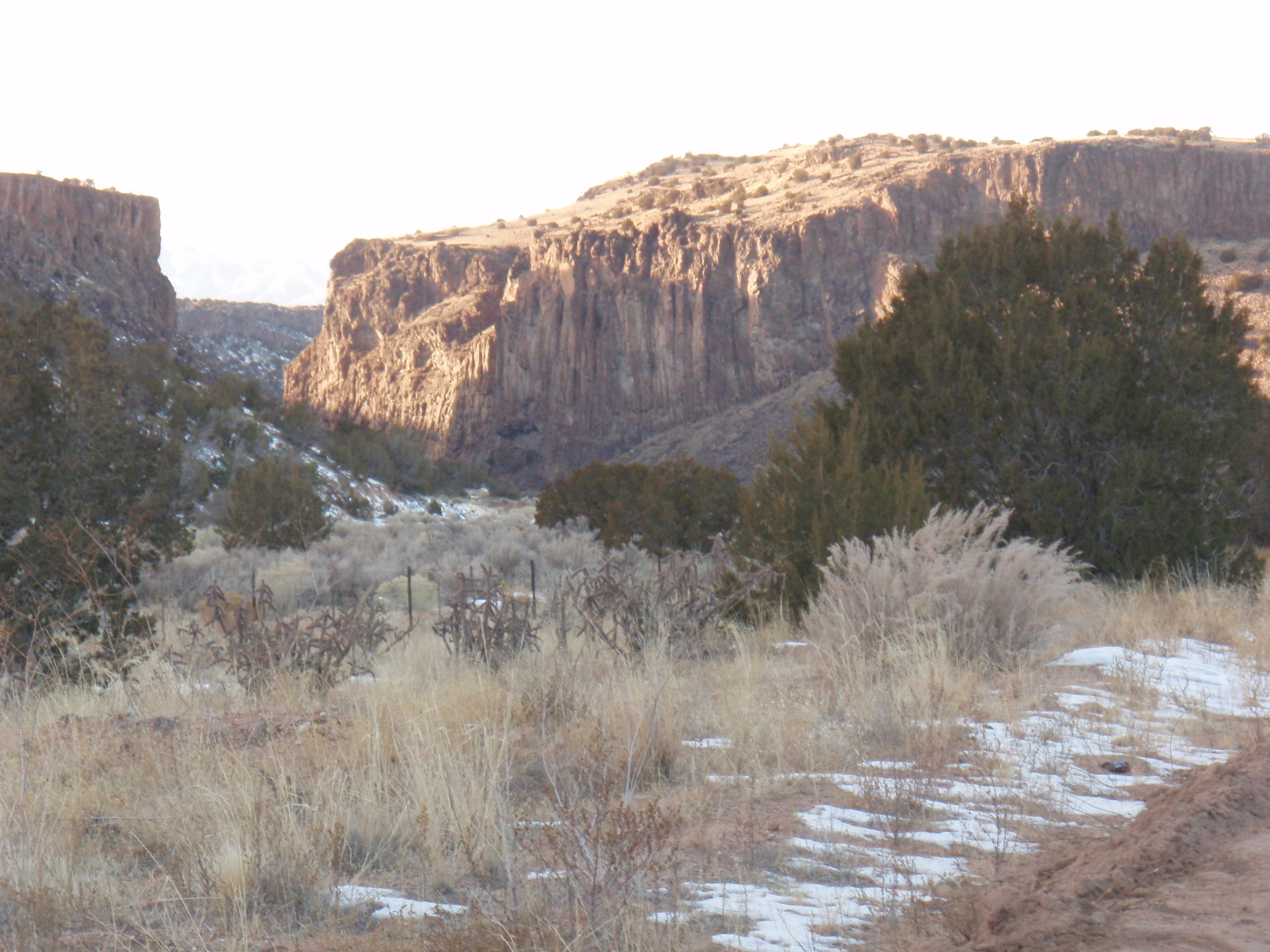 A dirt road in the desert.