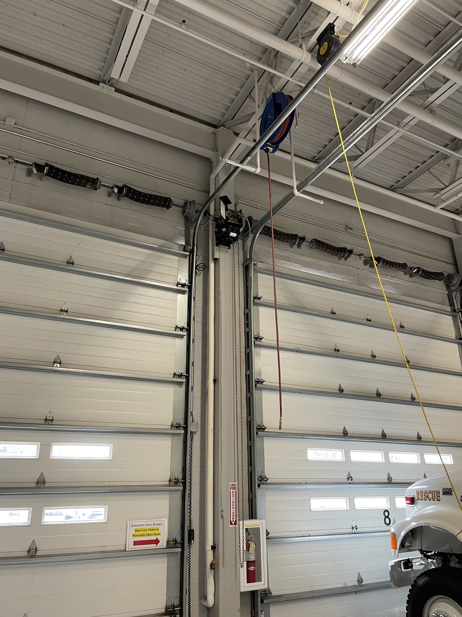 Fire Station 1, Bay 09:  Typical overhead motor installation