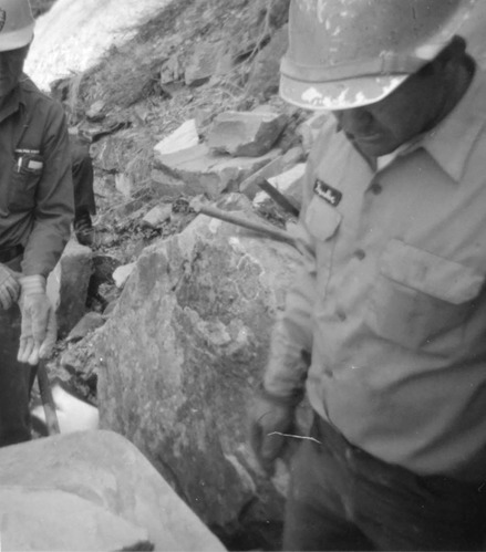 Workers repairing trail damage on the Hidden Canyon trail.