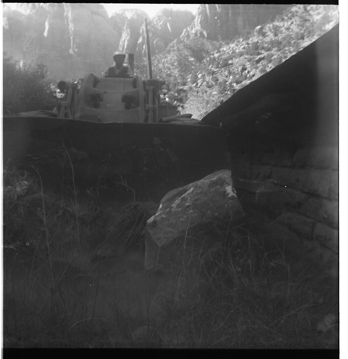 BW photo of rock slide in the maintenance yard.