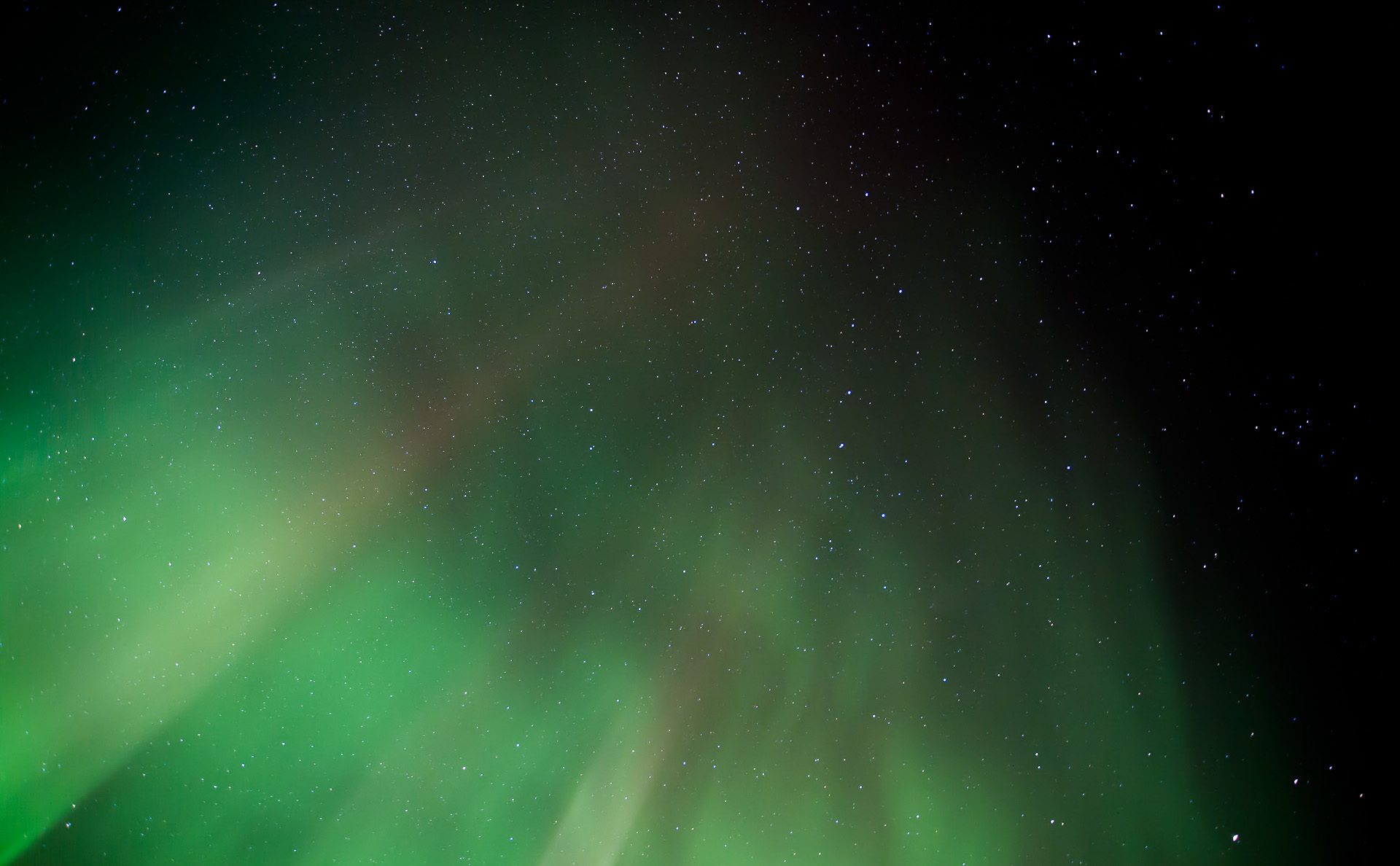 Green aurora and stars