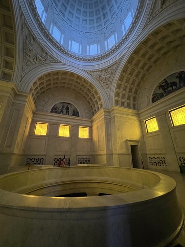 A wide-angled shot of the rotunda in a large mausoleum