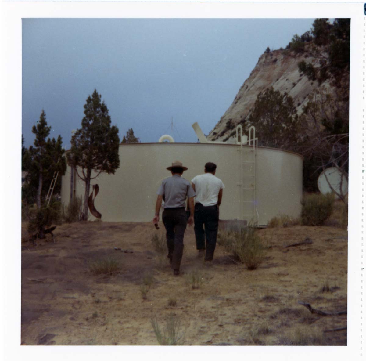 Repainting the exterior of the million gallon water tank at Birch Creek.