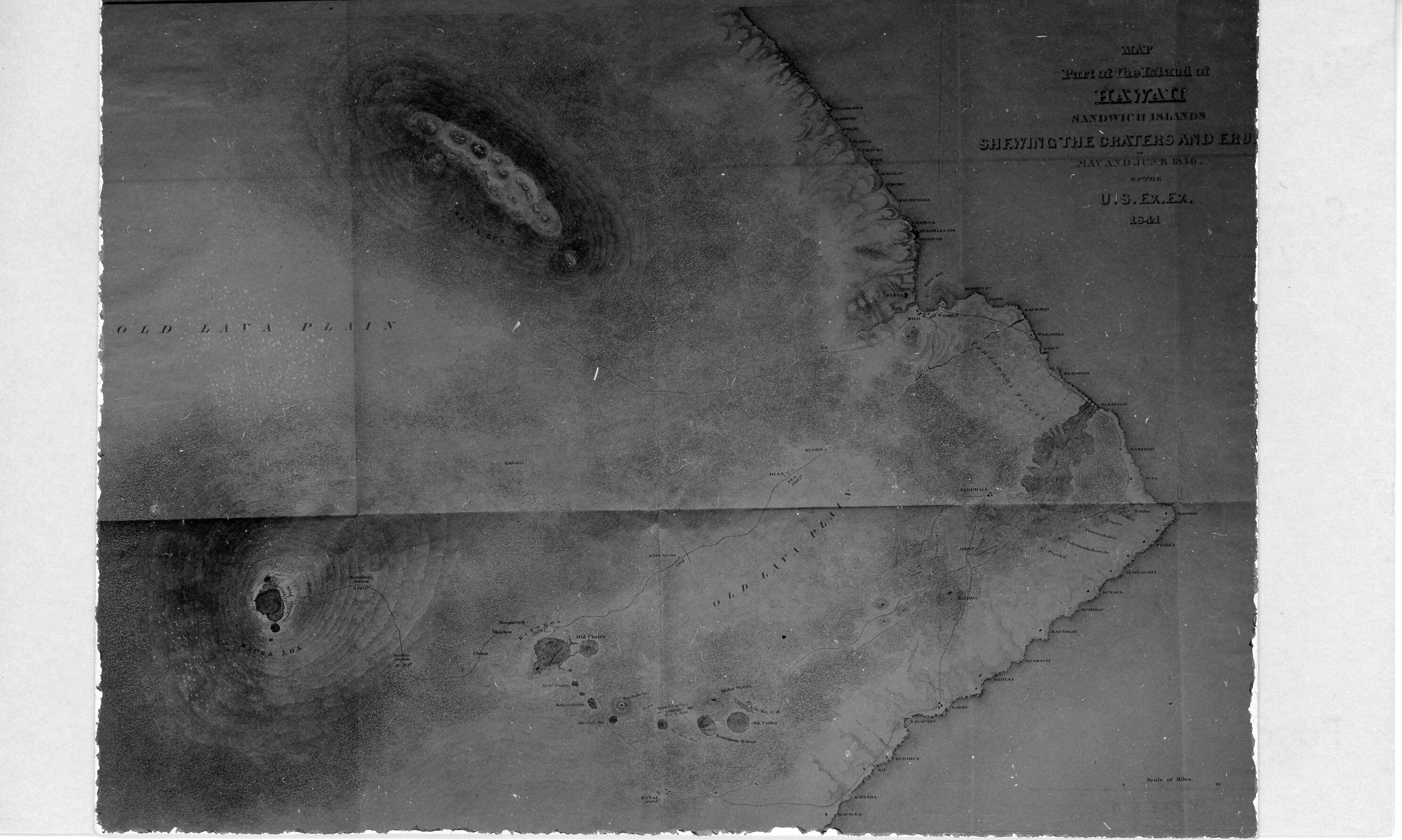 A black and white image of Charles Wilkes' topographical map of Hawaiʻi island. It is a map of the eastern portion of the island. Important towns represented by black dots are labeled along the coastline extending from Hilo to Kupapaʻu. It also has roughly drawn lines indicating roads/trails that go out from Hilo, along the coast, and around Mauna Loa and Kīlauea volcanoes.  There are circles and outlines of the various craters of Kīlauea and Mauna Loa. They are labeled. Around Mauna Loa crater there are a series of elevation lines going out from the crater to indicate elevation changes in the landscape.  There is a title for the map in the top right corner of the image. It reads, "MAP Part of the Island of Hawaii Sandwich Islands Shewing The Craters and Eru of May and June 1840 by the U. S. Ex. Ex. 1841." On the bottom right corner there is a scale for miles.