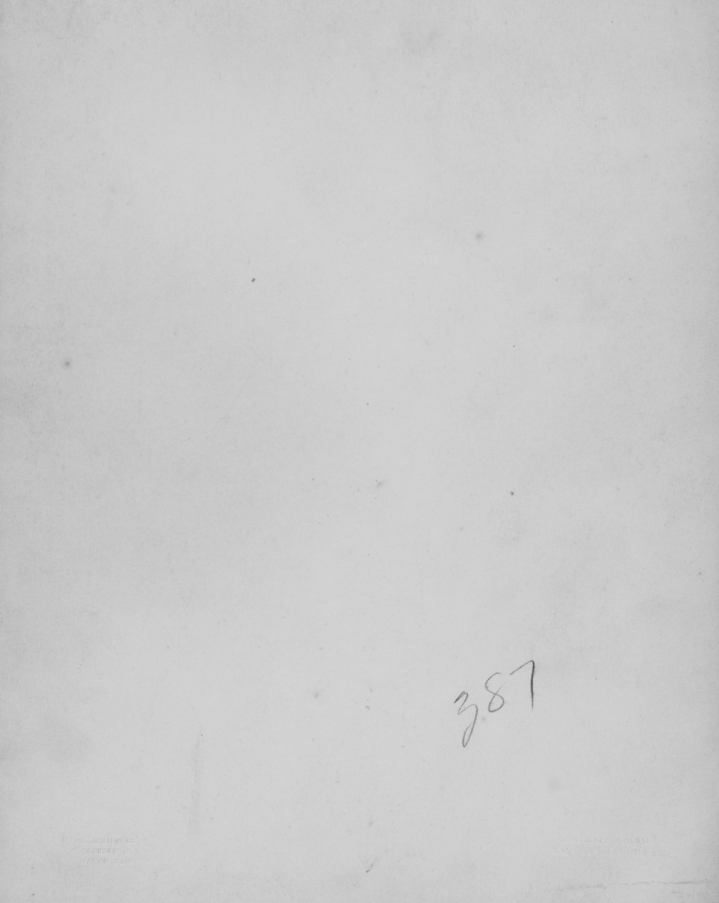 Reverse side of a photograph with a handwritten number "387."