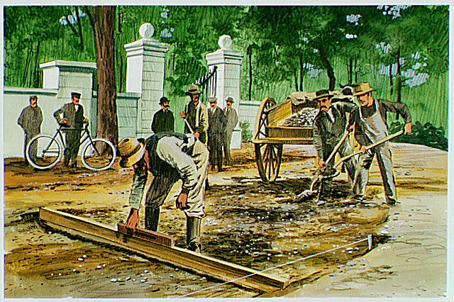 Men repairing street.