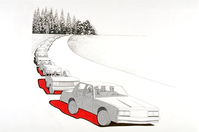 Scene depicts heavy vehicular traffic on approach road to Yosemite National Park.