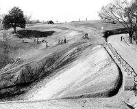 HPC-000901. CCC (Civilian Conservation Corps) enrollees carrying on erosion control operations along the Graveyard Road in front of Stockade Redan. Here huge gullies which were eating their way towards the Redan have been filled and sloped. Vicksburg National Military Park.