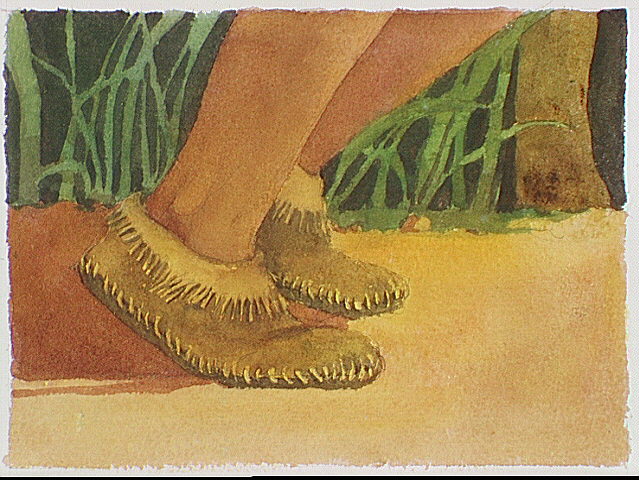 Detail of Indian moccasins on a trail.