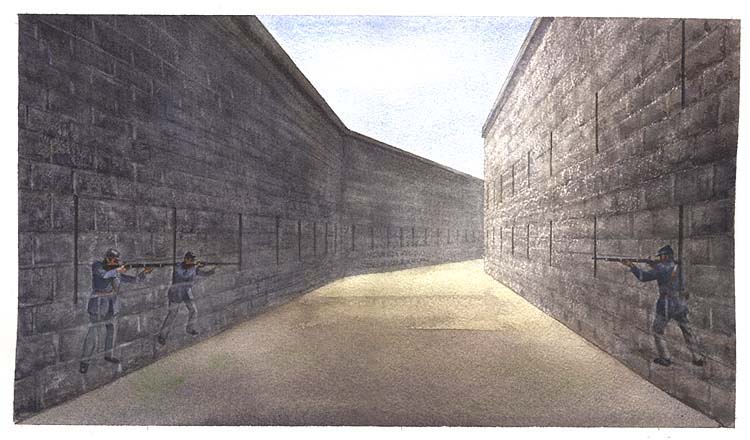 The "Dry Moat" between two 30-foot high granite walls. The wall on the right being the outer wall of Fort Tompkins and the wall on the left being the "Counterscarp Gallery".
