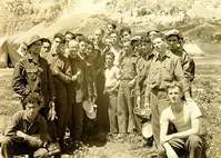 hpc-000089.jpg. Group of boys at the CCC (Civilian Conservation Corps) Camp at Many Glacier, Glacier National Park, made up mostly of boys from New Your City. In the center is Dominick Laulette. . .said to be the shortest man in the CCC Army. This is Camp #4, Company 1240, CCC.